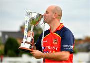 22 August 2021; Brigade captain Andrew Britton with the trophy after his side's victory over Cork Harlequins in their Clear Currency All-Ireland T20 Cup Final match at Leinster Cricket Club in Dublin. Photo by Seb Daly/Sportsfile