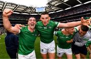 22 August 2021; Seán Finn, left, and Gearóid Hegarty, centre, of Limerick celebrate after the GAA Hurling All-Ireland Senior Championship Final match between Cork and Limerick in Croke Park, Dublin. Photo by Eóin Noonan/Sportsfile