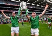 22 August 2021; Limerick players Diarmuid Byrnes, left, and Aaron Gillane celebrate with the Liam MacCarthy Cup after the GAA Hurling All-Ireland Senior Championship Final match between Cork and Limerick in Croke Park, Dublin. Photo by Piaras Ó Mídheach/Sportsfile