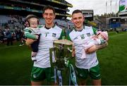22 August 2021; Limerick goalkeepers Nickie Quaid, left, with his son Daithi and Barry Hennessy with his daughter Hope after the GAA Hurling All-Ireland Senior Championship Final match between Cork and Limerick in Croke Park, Dublin. Photo by Stephen McCarthy/Sportsfile