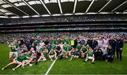 22 August 2021; Limerick players and staff celebrate with the Liam MacCarthy Cup after the GAA Hurling All-Ireland Senior Championship Final match between Cork and Limerick in Croke Park, Dublin. Photo by Stephen McCarthy/Sportsfile