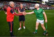 22 August 2021; Cian Lynch of Limerick with Cork manager Kieran Kingston, centre, and Cork selector Diarmuid O'Sullivan, left, after the GAA Hurling All-Ireland Senior Championship Final match between Cork and Limerick in Croke Park, Dublin. Photo by Stephen McCarthy/Sportsfile