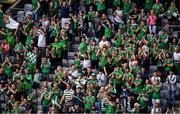 22 August 2021; Limerick supporters in the Davin Stand cheer on their side at the half time break during the GAA Hurling All-Ireland Senior Championship Final match between Cork and Limerick in Croke Park, Dublin. Photo by Daire Brennan/Sportsfile