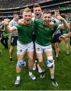 22 August 2021; Peter Casey, left, Mike Casey, centre, and Graeme Mulcahy of Limerick celebrate after the GAA Hurling All-Ireland Senior Championship Final match between Cork and Limerick in Croke Park, Dublin. Photo by Ramsey Cardy/Sportsfile