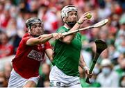 22 August 2021; Cian Lynch of Limerick in action against Mark Coleman of Cork during the GAA Hurling All-Ireland Senior Championship Final match between Cork and Limerick in Croke Park, Dublin. Photo by Ramsey Cardy/Sportsfile