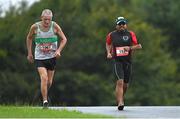 21 August 2021; Dave Brady, left, and Adolfo Garcia, both of Marathon Club of Ireland, competing in the Irish National 50 kilometre and 100 kilometre Championships, incorporating the Anglo Celtic Plate, at Mondello Park in Naas, Kildare. Photo by Brendan Moran/Sportsfile