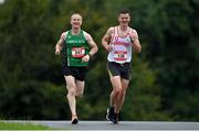21 August 2021; Liam Ryan of Carrick Ages AC, Monaghan, left, and Donatas Jocius of Crusaders AC, Dublin, competing in the Irish National 50 kilometre and 100 kilometre Championships, incorporating the Anglo Celtic Plate, at Mondello Park in Naas, Kildare. Photo by Brendan Moran/Sportsfile