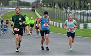 21 August 2021; Peter O'Toole of Newbridge AC, Kildare, left, Edel Quinn and Anne Tormey of Garristown Flyers AC, Dublin, competing in the Irish National 50 kilometre and 100 kilometre Championships, incorporating the Anglo Celtic Plate, at Mondello Park in Naas, Kildare. Photo by Brendan Moran/Sportsfile