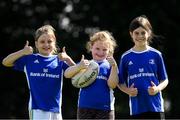 24 August 2021; Jessica Pearson, centre age 7, with Alice Mahon, age 8, left, and Niamh Gleeson, right age 8, during the Bank of Ireland Leinster Rugby Summer Camp at Cill Dara RFC in Kildare. Photo by Matt Browne/Sportsfile
