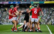 22 August 2021; Linesman James Owens attempts to seperate players from both sides during the GAA Hurling All-Ireland Senior Championship Final match between Cork and Limerick in Croke Park, Dublin. Photo by Brendan Moran/Sportsfile