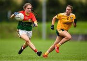 22 August 2021; Rachel Sawyer of Carlow and Duana Coleman of Antrim during the TG4 All-Ireland Ladies Football Junior Championship Semi-Final match between Antrim and Carlow at Lannleire GFC in Dunleer, Louth. Photo by Ben McShane/Sportsfile
