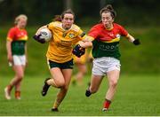 22 August 2021; Ciara Austin of Antrim and Keeva Collins of Carlow during the TG4 All-Ireland Ladies Football Junior Championship Semi-Final match between Antrim and Carlow at Lannleire GFC in Dunleer, Louth. Photo by Ben McShane/Sportsfile