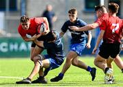 25 August 2021; Enda O’Brien of North-East is tackled by Hugh Donegan of Metropolitan during the Shane Horgan Cup Round 2 match between Metro and North East at Energia Park in Dublin.  Photo by Eóin Noonan/Sportsfile