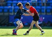 25 August 2021; Sean Lambe of North-East is tackled by Adam Gray of Metropolitan during the Shane Horgan Cup Round 2 match between Metro and North East at Energia Park in Dublin.  Photo by Eóin Noonan/Sportsfile