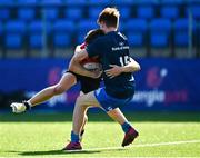 25 August 2021; Sean Lambe of North-East is tackled by Adam Gray of Metropolitan during the Shane Horgan Cup Round 2 match between Metro and North East at Energia Park in Dublin.  Photo by Eóin Noonan/Sportsfile
