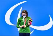 26 August 2021; Ellen Keane of Ireland looks at her gold medal after winning the Women's SB8 100 metre breaststroke final at the Tokyo Aquatic Centre on day two during the Tokyo 2020 Paralympic Games in Tokyo, Japan. Photo by Sam Barnes/Sportsfile