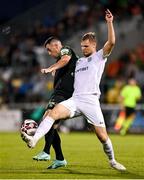 26 August 2021; Aaron Greene of Shamrock Rovers in action against Markkus Seppik of Flora Tallinn during the UEFA Europa Conference League play-off second leg match between Shamrock Rovers and Flora Tallinn at Tallaght Stadium in Dublin. Photo by Seb Daly/Sportsfile