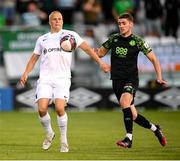 26 August 2021; Henrik Ojamaa of Flora Tallinn in action against Dylan Watts of Shamrock Rovers during the UEFA Europa Conference League play-off second leg match between Shamrock Rovers and Flora Tallinn at Tallaght Stadium in Dublin. Photo by Stephen McCarthy/Sportsfile