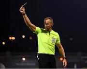 26 August 2021; Referee Tamás Bognár issues a yellow card during the UEFA Europa Conference League play-off second leg match between Shamrock Rovers and Flora Tallinn at Tallaght Stadium in Dublin. Photo by Stephen McCarthy/Sportsfile