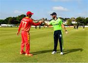 27 August 2021; Team captains Andrew Balbirnie of Ireland, right, and Craig Ervine of Zimbabwe before match one of the Dafanews T20 series between Ireland and Zimbabwe at Clontarf Cricket Club in Dublin. Photo by Seb Daly/Sportsfile