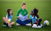 27 August 2021; Republic of Ireland international Emily Whelan with Ellie Collins, left, and Marwa Babiker of St Mochtas FC at the launch of the Disney Playmakers football program at the FAI National Training Centre in Abbotstown, Dublin. Playmakers employs an innovative storytelling approach featuring much-loved Disney characters to help more girls see the fun in regular physical exercise and football. Girls across the Republic of Ireland are being encouraged to kickstart a lifelong love of football through a ground-breaking Playmakers football programme from UEFA and Disney. Photo by Stephen McCarthy/Sportsfile