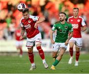 27 August 2021; Jack Hickman of St Patrick's Athletic in action against Dylan McGlade of Cork City  during the extra.ie FAI Cup Second Round match between Cork City and St Patrick's Athletic at Turner's Cross in Cork. Photo by Piaras Ó Mídheach/Sportsfile