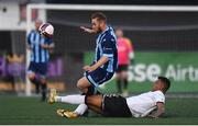 27 August 2021; Gareth McCaffrey of St Mochta's is tackled by Sonni Nattestad of Dundalk during the extra.ie FAI Cup second round match between Dundalk and St Mochta's at Oriel Park in Dundalk. Photo by Ben McShane/Sportsfile