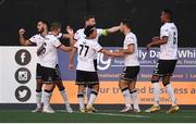 27 August 2021; Dundalk players celebrate after their first goal, scored by Sami Ben Amar, left, during the extra.ie FAI Cup second round match between Dundalk and St Mochta's at Oriel Park in Dundalk. Photo by Ben McShane/Sportsfile