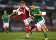 27 August 2021; Dylan McGlade of Cork City in action against Jack Hickman of St Patrick's Athletic during the extra.ie FAI Cup Second Round match between Cork City and St Patrick's Athletic at Turner's Cross in Cork. Photo by Piaras Ó Mídheach/Sportsfile