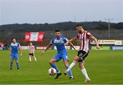 27 August 2021; Daniel Lafferty of Derry City in action against Adam Foley of Finn Harps during the extra.ie FAI Cup Second Round match between Finn Harps and Derry City at Finn Park in Ballybofey, Donegal. Photo by Ramsey Cardy/Sportsfile