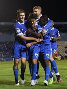 27 August 2021; Phoenix Patterson of Waterford celebrates with team-mates after scoring his side's fourth goal during the extra.ie FAI Cup Second Round match between Waterford and Kilnamanagh at RSC In Waterford. Photo by Matt Browne/Sportsfile