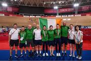 28 August 2021; Katie-George Dunlevy, left, and Eve McCrystal of Ireland with their silver medals, with, from left, Alan Swanson, manager Denis Toomey, mechanic Stephen Edwards, head coach Neill Delahaye, Eamonn Byrne, Martin Gordon, physio David Greene, team doctor Katie Lydon and Chutya Nishimatsu after the Women's B 3000 metre Individual Pursuit final at the Izu Velodrome on day four during the Tokyo 2020 Paralympic Games in Shizuoka, Japan. Photo by David Fitzgerald/Sportsfile