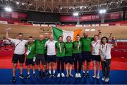 28 August 2021; Katie-George Dunlevy, left, and Eve McCrystal of Ireland with their silver medals, with, from left, Alan Swanson, manager Denis Toomey, mechanic Stephen Edwards, head coach Neill Delahaye, Eamonn Byrne, Martin Gordon, physio David Greene, team doctor Katie Lydon and Chutya Nishimatsu after the Women's B 3000 metre Individual Pursuit final at the Izu Velodrome on day four during the Tokyo 2020 Paralympic Games in Shizuoka, Japan. Photo by David Fitzgerald/Sportsfile