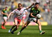 28 August 2021; Liam Kelly of Meath in action against Cormac Devlin of Tyrone during the Electric Ireland GAA Football All-Ireland Minor Championship Final match between Meath and Tyrone at Croke Park in Dublin. Photo by Piaras Ó Mídheach/Sportsfile