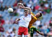 28 August 2021; Meath goalkeeper Oisín McDermott punches the ball away from Jack Martin of Tyrone during the Electric Ireland GAA Football All-Ireland Minor Championship Final match between Meath and Tyrone at Croke Park in Dublin. Photo by Piaras Ó Mídheach/Sportsfile