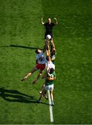 28 August 2021; Referee David Coldrick throws in the ball between Conn Kilpatrick, left, and Brian Kennedy of Tyrone and Jack Barry, left, and David Moran of Kerry to start the GAA Football All-Ireland Senior Championship semi-final match between Kerry and Tyrone at Croke Park in Dublin. Photo by Daire Brennan/Sportsfile