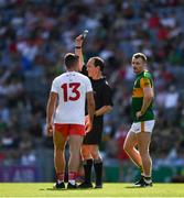 28 August 2021; Tom O'Sullivan of Kerry looks on as referee David Coldrick shows a black card to Darren McCurry of Tyrone during the GAA Football All-Ireland Senior Championship semi-final match between Kerry and Tyrone at Croke Park in Dublin. Photo by Ray McManus/Sportsfile