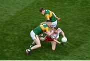28 August 2021; Ben McDonnell of Tyrone in action against Jason Foley, left, and Gavin White of Kerry during the GAA Football All-Ireland Senior Championship semi-final match between Kerry and Tyrone at Croke Park in Dublin. Photo by Daire Brennan/Sportsfile