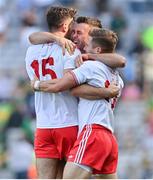 28 August 2021; Tyrone players, from left, Conor McKenna, Darren McCurry and Mark Bradley celebrate at the final whistle of the GAA Football All-Ireland Senior Championship semi-final match between Kerry and Tyrone at Croke Park in Dublin. Photo by Brendan Moran/Sportsfile