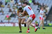 28 August 2021; Adrian Spillane of Kerry is tackled by Matthew Donnelly of Tyrone during the GAA Football All-Ireland Senior Championship semi-final match between Kerry and Tyrone at Croke Park in Dublin. Photo by Brendan Moran/Sportsfile