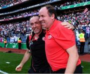 28 August 2021; Tyrone joint-managers Feargal Logan, right, and Brian Dooher celebrate after the GAA Football All-Ireland Senior Championship semi-final match between Kerry and Tyrone at Croke Park in Dublin. Photo by Piaras Ó Mídheach/Sportsfile
