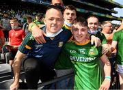 28 August 2021; Hughie Corcoran of Meath celebrates with family members, including his dad Adrian, after the Electric Ireland GAA Football All-Ireland Minor Championship Final match between Meath and Tyrone at Croke Park in Dublin. Photo by Ray McManus/Sportsfile