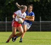 28 August 2021; Aiobhinn McHugh of Tyrone in action against Niamh Hayes of Tipperary during the TG4 All-Ireland Ladies SFC relegation play-off match between Tipperary and Tyrone at Coralstown Kinnegad GAA Club Kinnegad, Westmeath. Photo by Matt Browne/Sportsfile