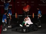 29 August 2021; Britney Arendse of Ireland and coach Roy Guerin embrace after she lifted 107kg in the Women's 73kg final at the Tokyo International Forum on day five during the Tokyo 2020 Paralympic Games in Tokyo, Japan. Photo by David Fitzgerald/Sportsfile