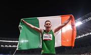 29 August 2021; Jason Smyth of Ireland celebrates with the tricolour after winning the T13 Men's 100 metre final at the Olympic Stadium on day five during the Tokyo 2020 Paralympic Games in Tokyo, Japan. Photo by Sam Barnes/Sportsfile