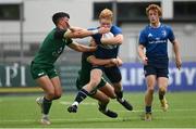 29 August 2021; Hugh Cooney of Leinster is tackled by Liam Golden and John Devine of Connacht during the IRFU U19 Men’s Clubs Interprovincial Championship Round 2 match between Leinster and Connacht at Energia Park in Dublin. Photo by Harry Murphy/Sportsfile