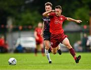 29 August 2021; Eoin Fowler of Killester Donnycarney in action against Paul Cleary of Wexford during the extra.ie FAI Cup Second Round match between Killester Donnycarney and Wexford at Hadden Park in Killester, Dublin. Photo by Eóin Noonan/Sportsfile