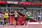 29 August 2021; Jason Smyth of Ireland, second from right, crosses the line to win the T13 Men's 100 metre final ahead of Skander Djamil Athmani of Algeria,second from left, who finished second, at the Olympic Stadium on day five during the Tokyo 2020 Paralympic Games in Tokyo, Japan. Photo by Sam Barnes/Sportsfile