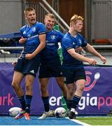 29 August 2021; Sam Prendergast of Leinster, left, celebrates with Noah Sheridan and Ethan Laing after scoring his side's third try during the IRFU U19 Men’s Clubs Interprovincial Championship Round 2 match between Leinster and Connacht at Energia Park in Dublin. Photo by Harry Murphy/Sportsfile