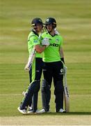 29 August 2021; Harry Tector, left, and George Dockrell of Ireland congratulate each other after their side's victory over Zimbabwe during match two of the Dafanews T20 series at Clontarf Cricket Club in Dublin. Photo by Seb Daly/Sportsfile